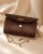 torebka-wizytowa-z-drewna-vesper-delta-padauk-perspektywa.webp