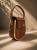 torebka-damska-organic-curve-tiger-boczny-profil.webp